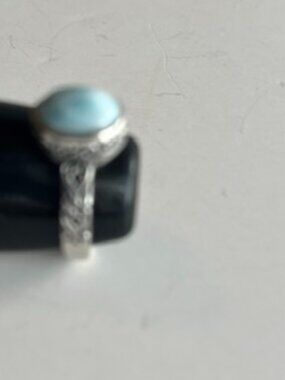 Sterling silver ring with natural larimar stone.